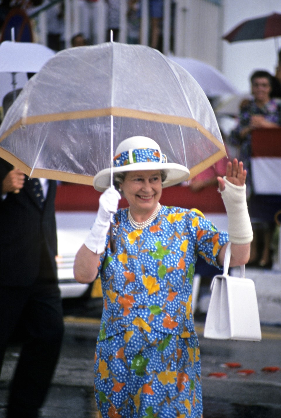 Queen Elizabeth II waving to the crowd